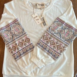 Brand new with tags. Embroidered sleeve long sleeve top
